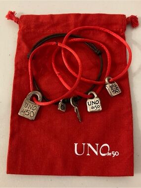 UNO de 50 Red and Brown Cord Charm Bracelet Set of 4 Plus Branded Pouch
